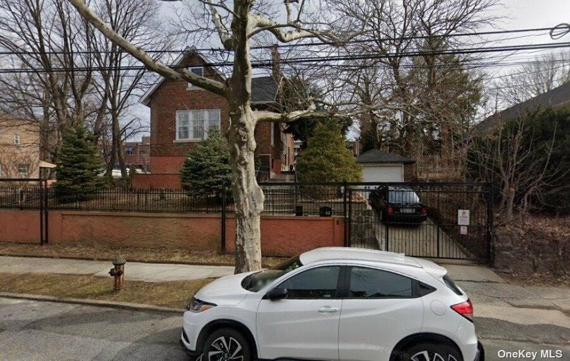 a car parked in front of a house