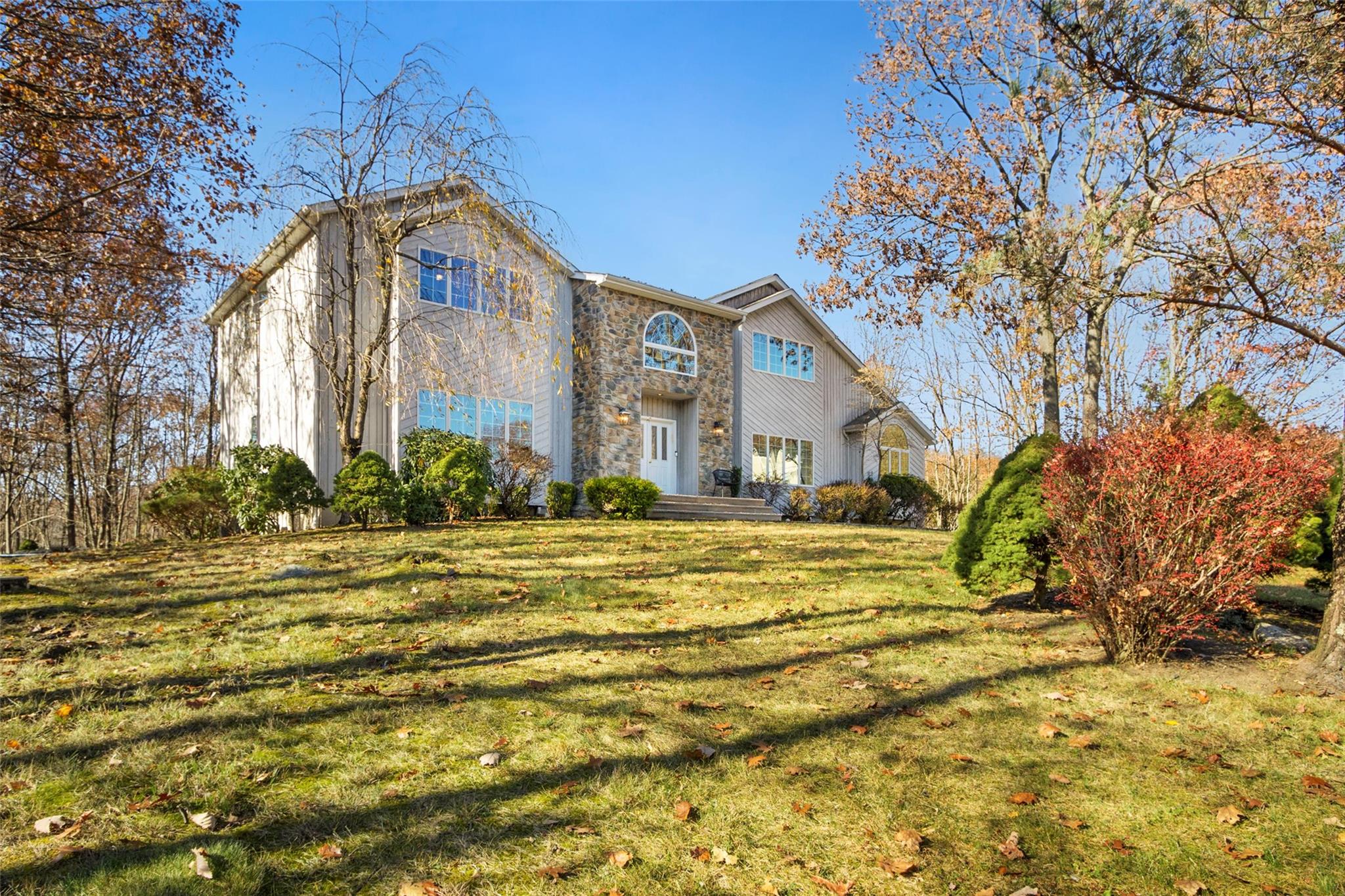 View of front of house featuring a front lawn