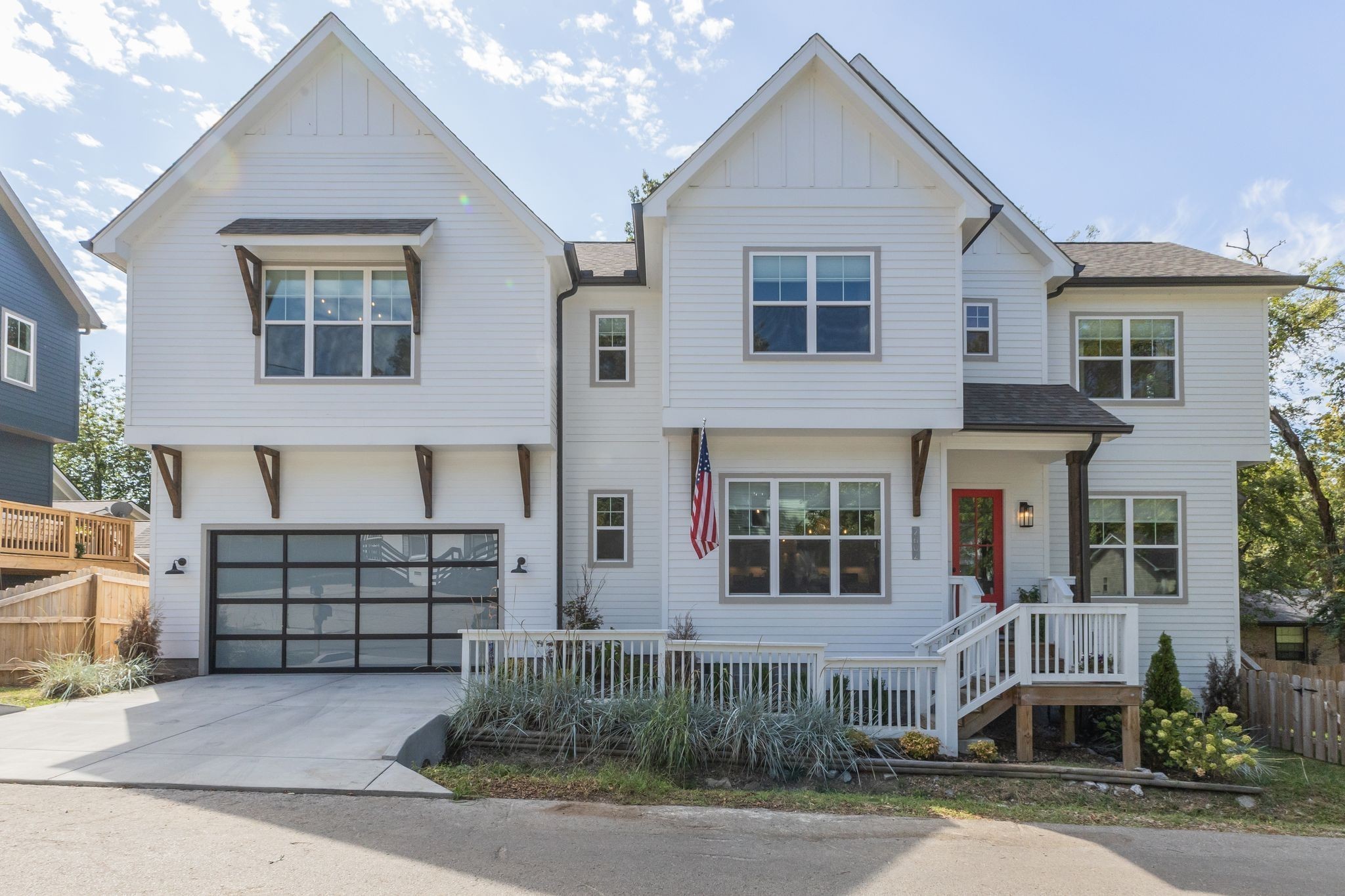 a front view of a house with a garage