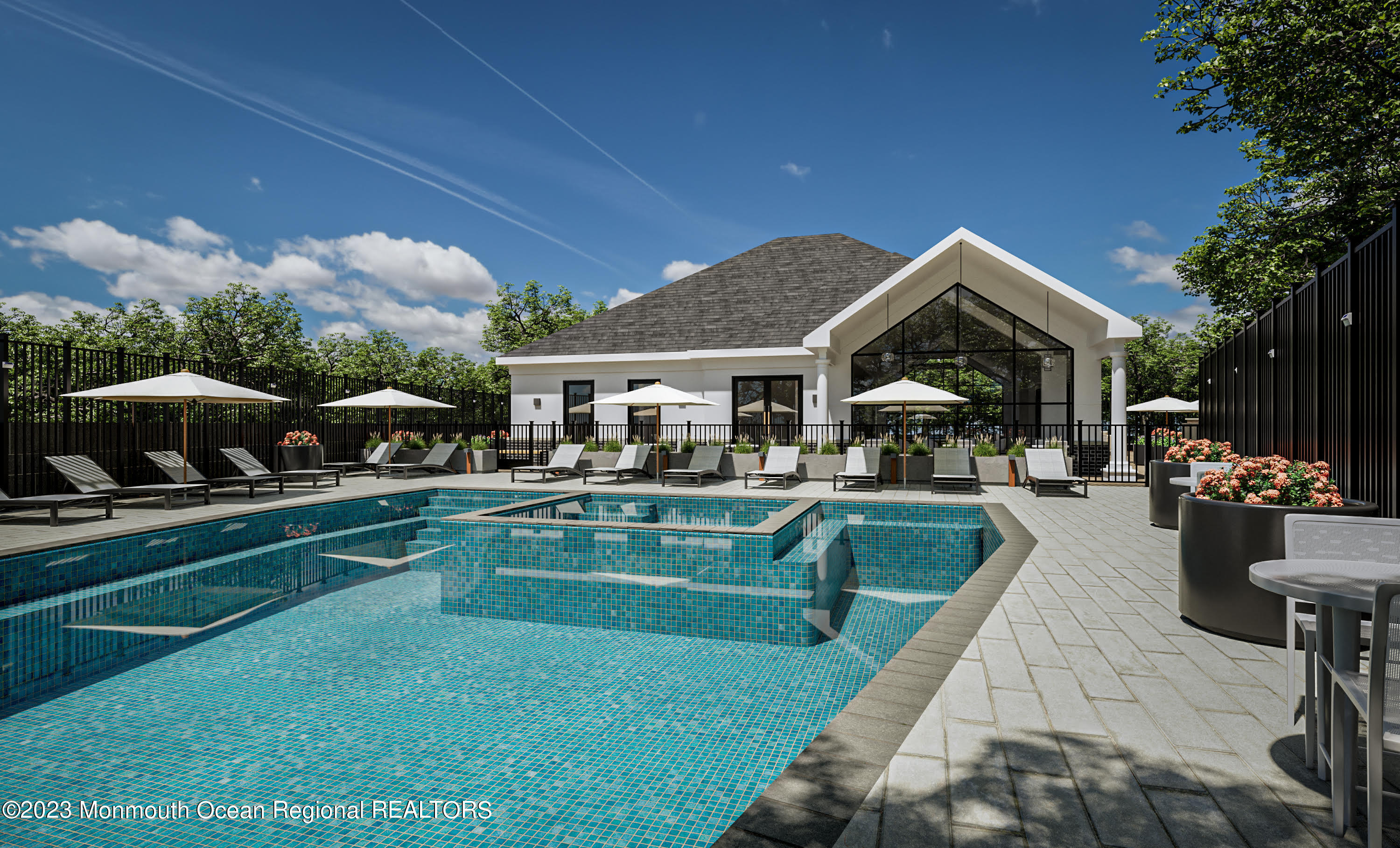 a swimming pool view with a seating space and a garden