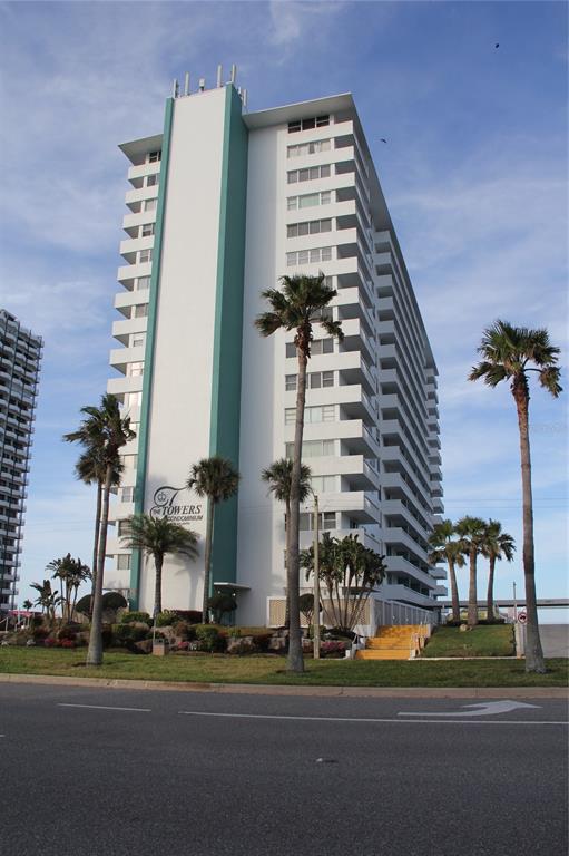 a front view of a building with street view