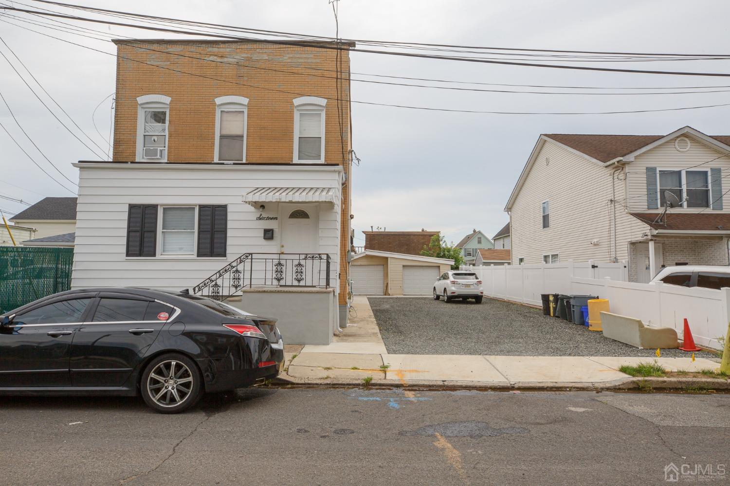 a car parked in front of a house