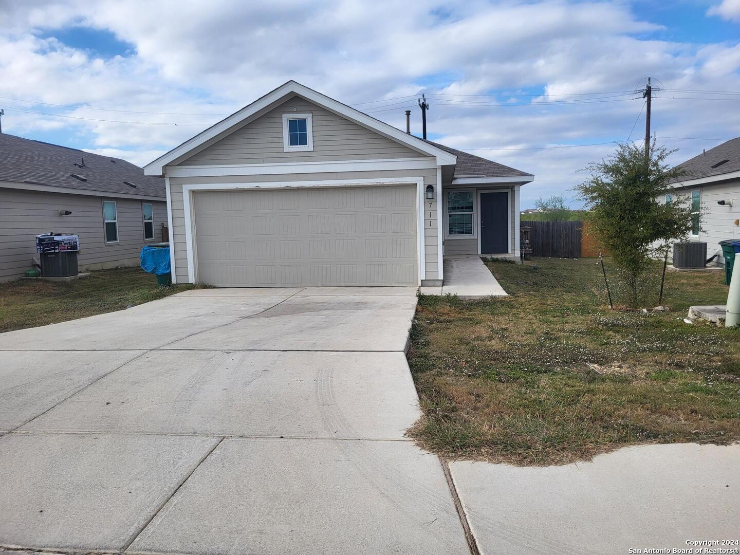 a front view of house with yard