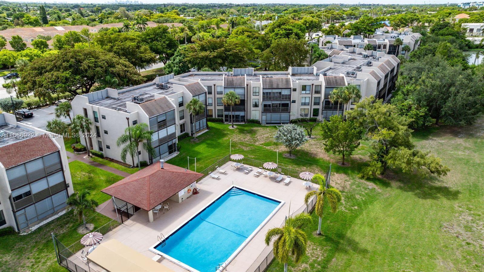 an aerial view of a house with a garden