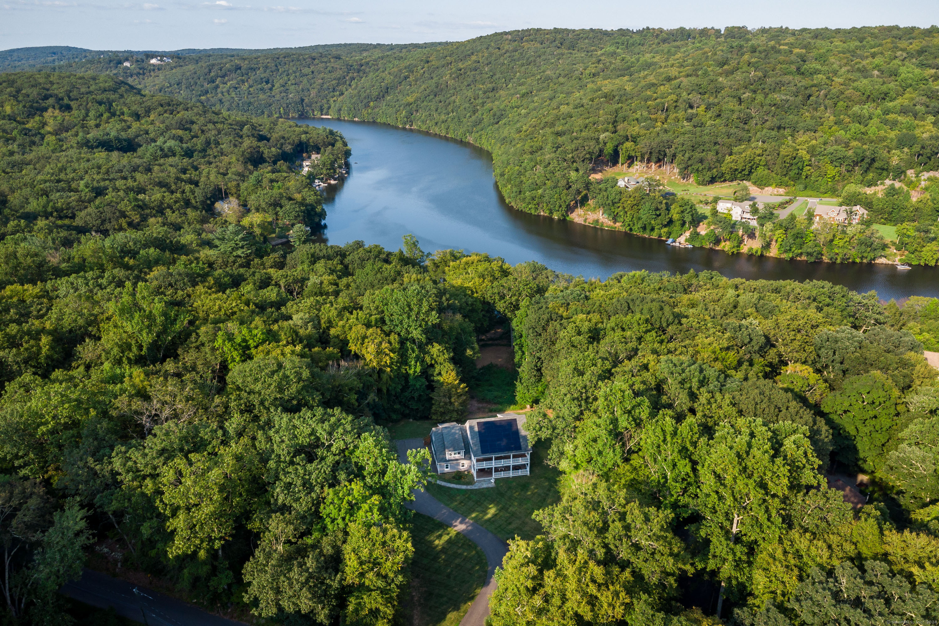 an aerial view of residential house with outdoor space