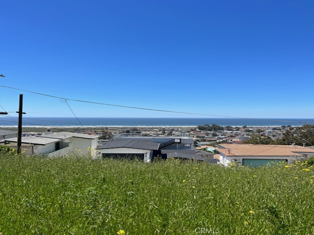 a view of a big yard with a house