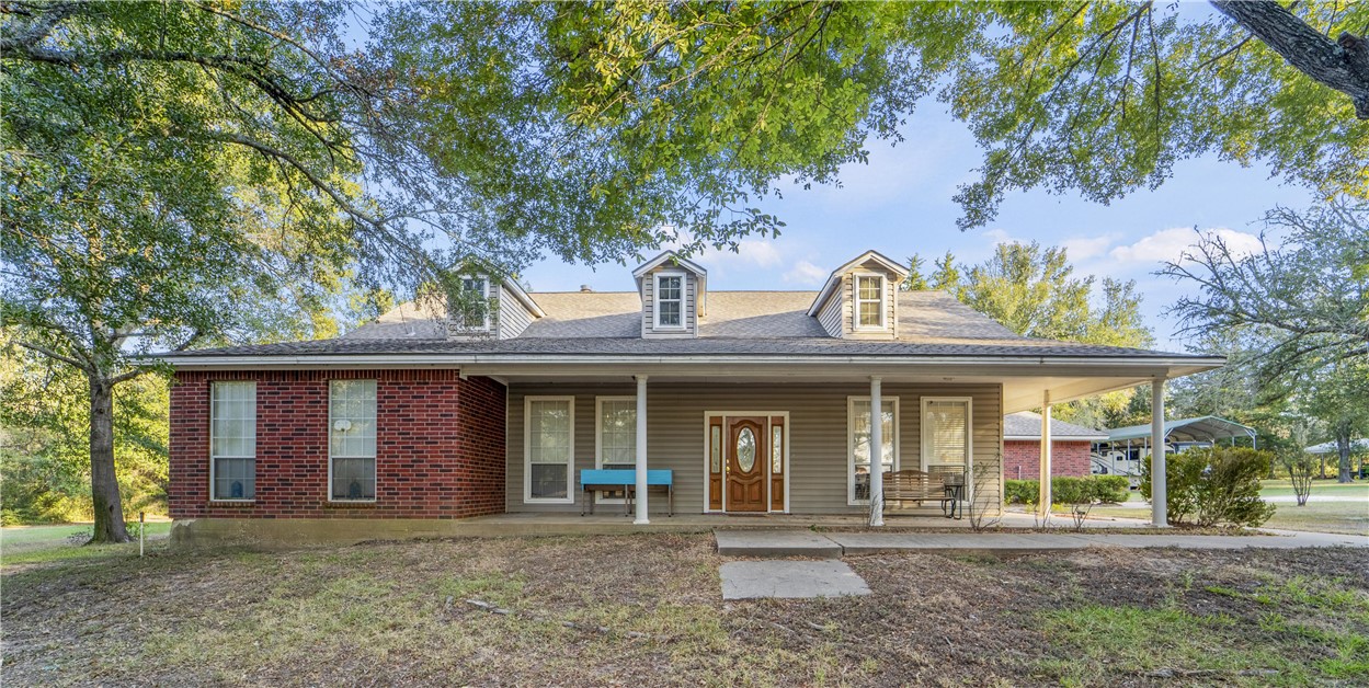 View of front of property with a porch