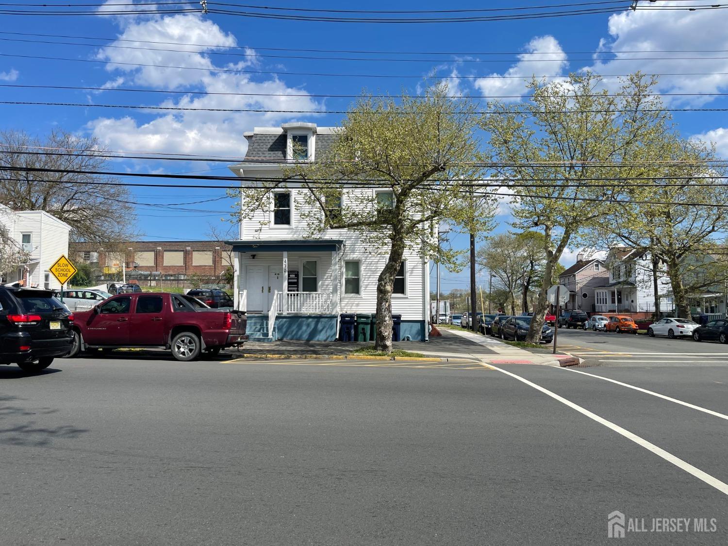 a view of a street with cars