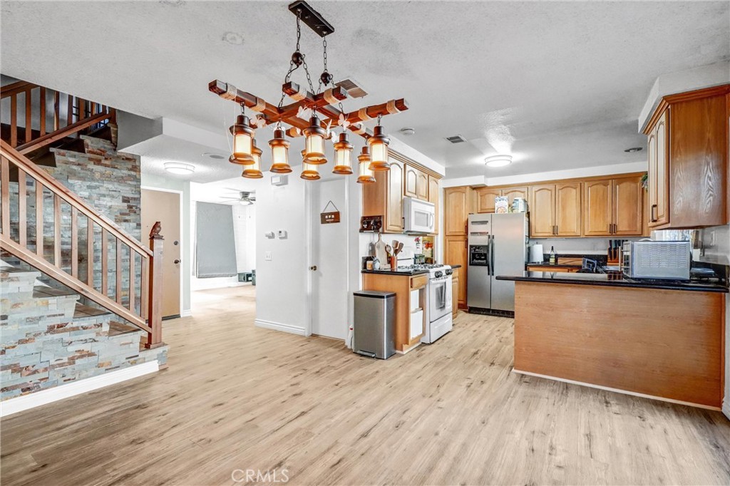 Kitchen, dining room, and living room view.