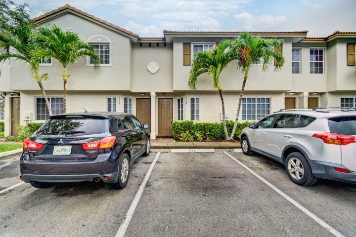 a car parked in front of a house