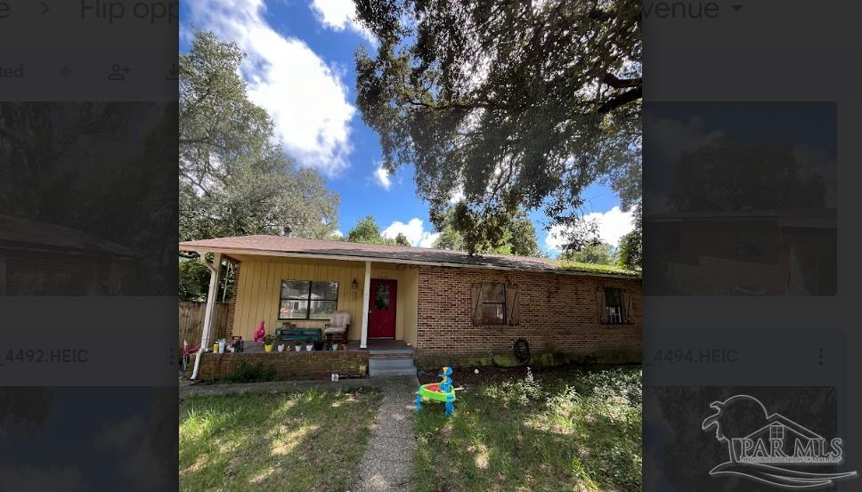 front view of a house with yard