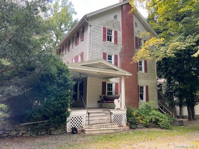 View of front of home with covered porch