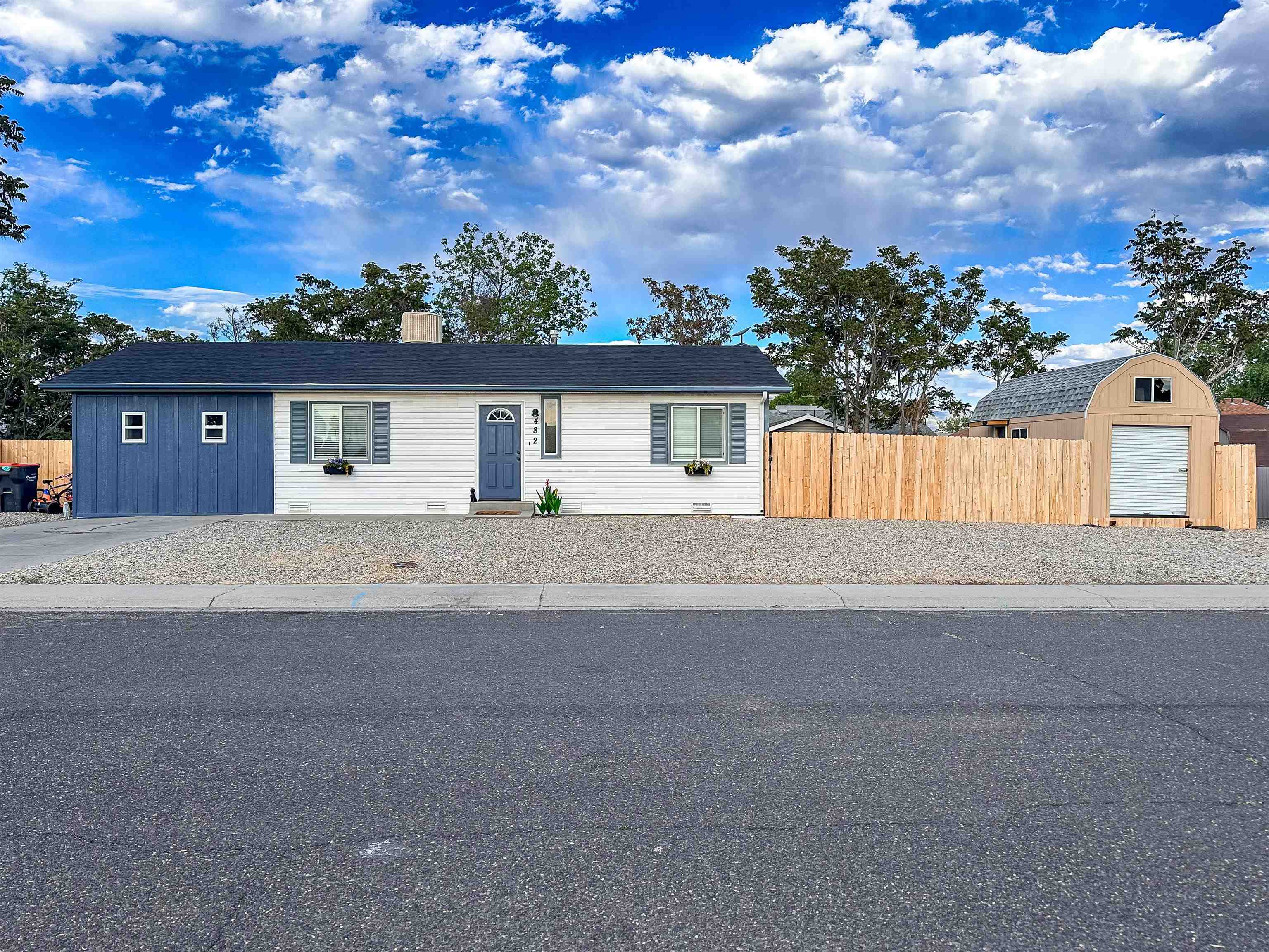 front view of a house with a street