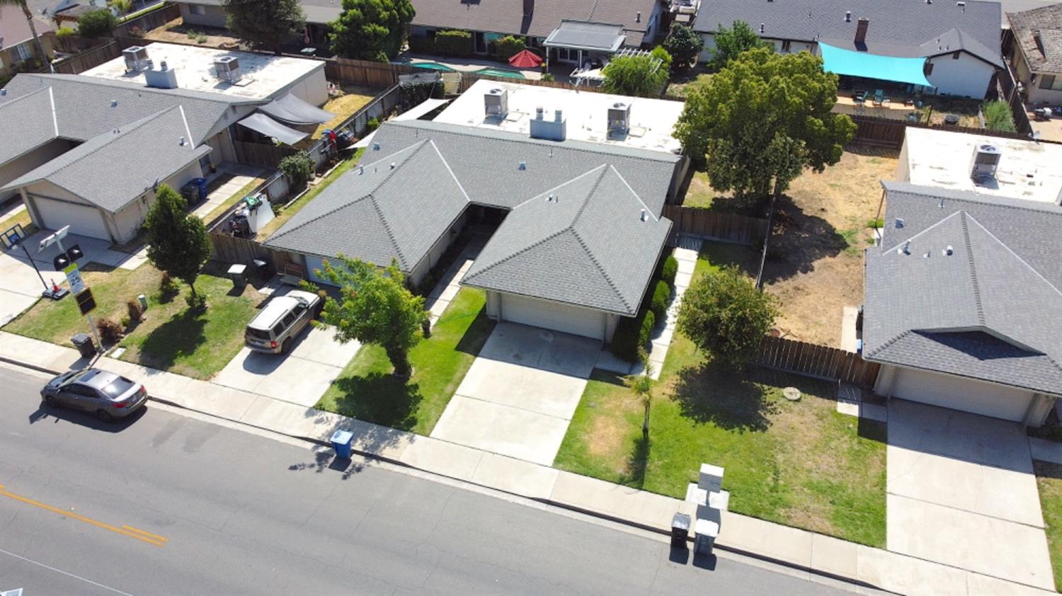 an aerial view of a house with a garden