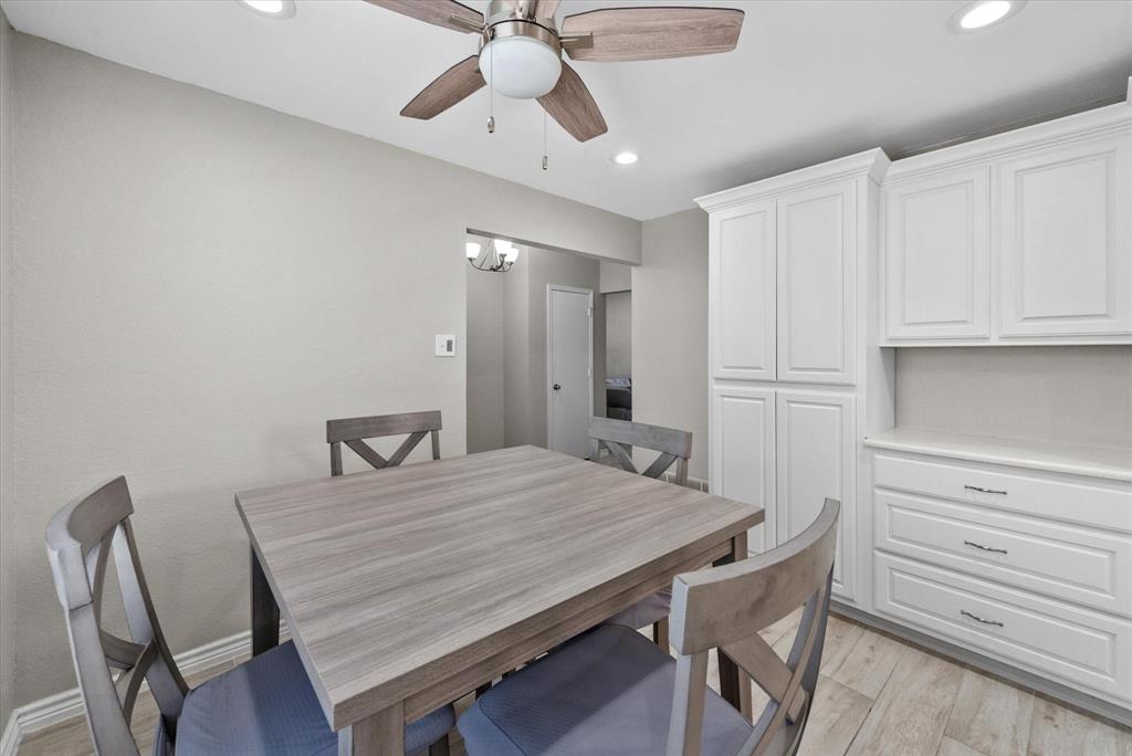 a view of a dining room with furniture