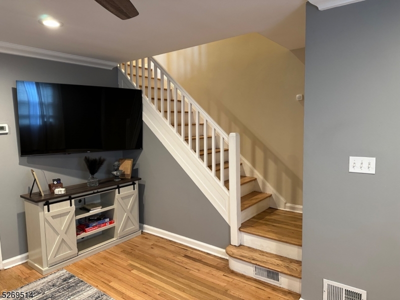 a view of livingroom with furniture and flat screen tv