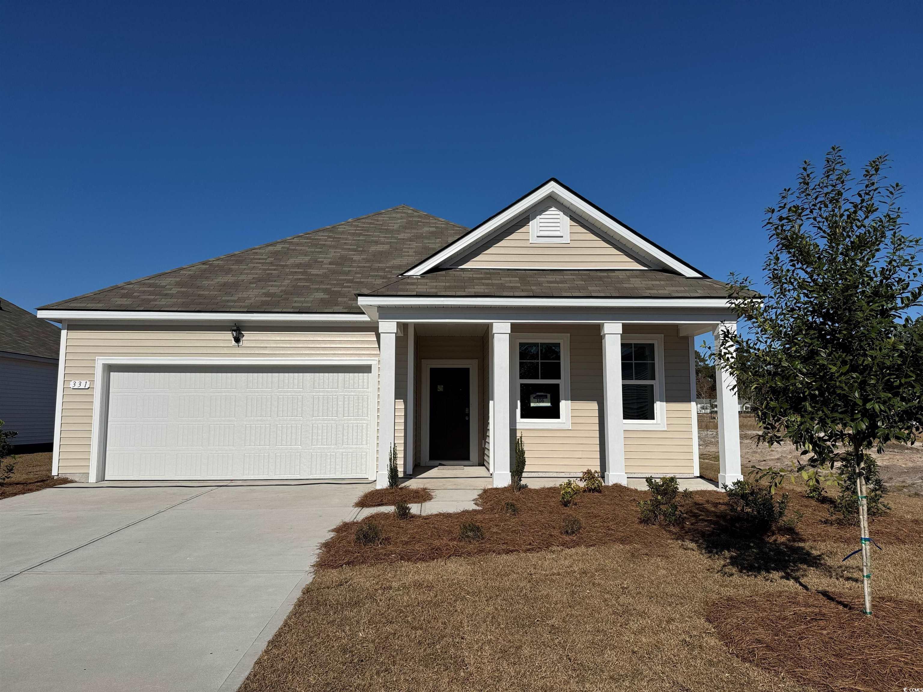 View of front of home with a garage