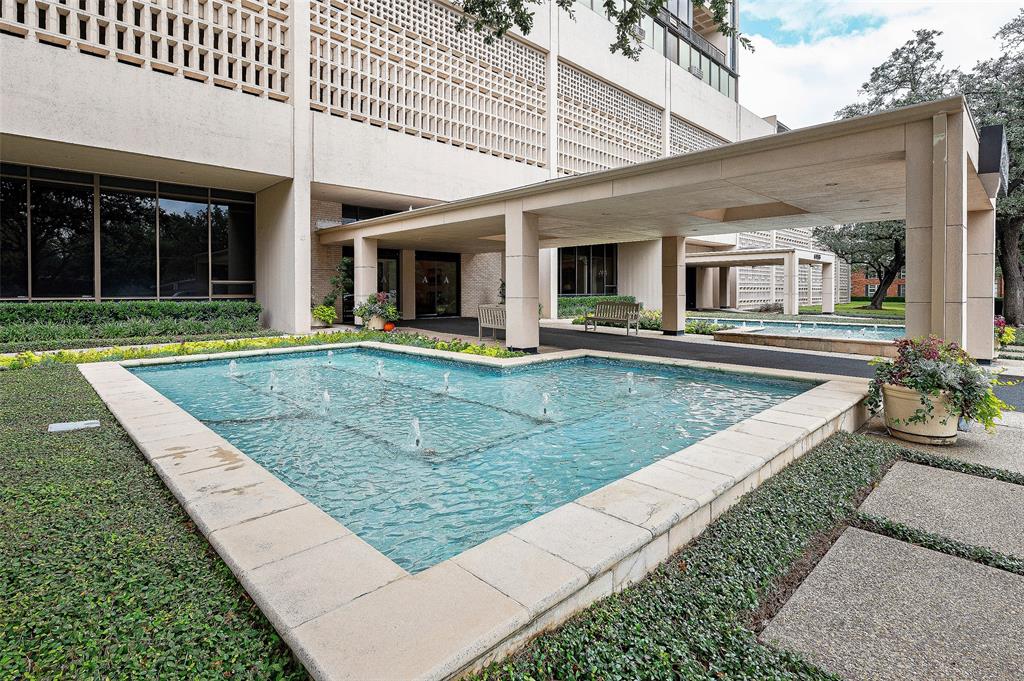 front view of a house with a swimming pool