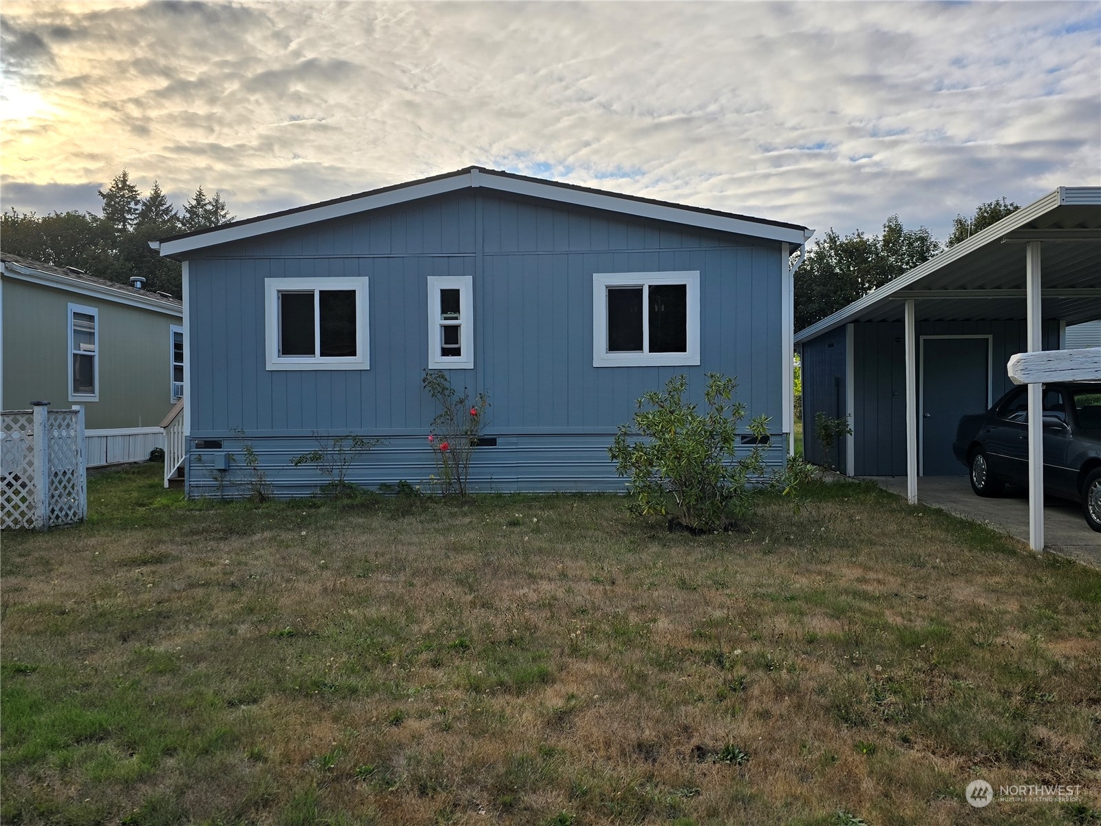 a house with trees in front of it