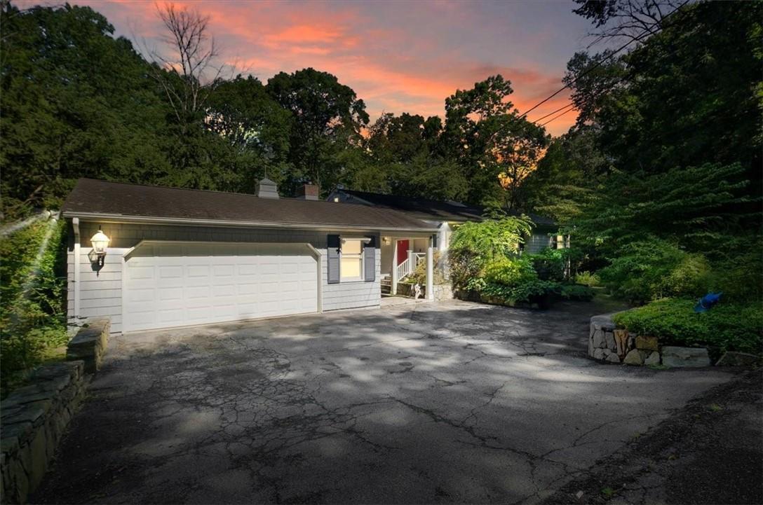 View of front of home with a garage