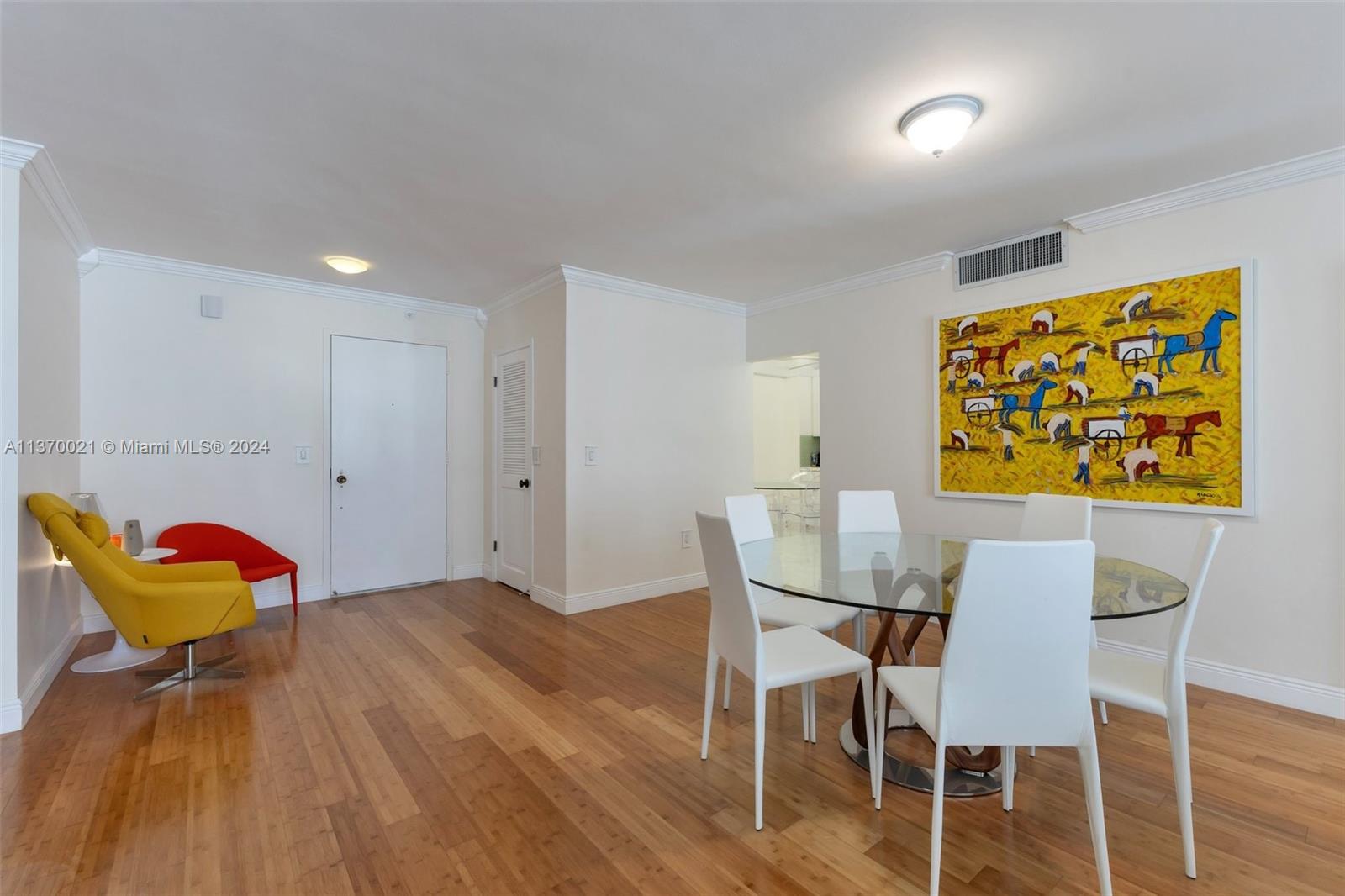 a workspace with furniture and wooden floor