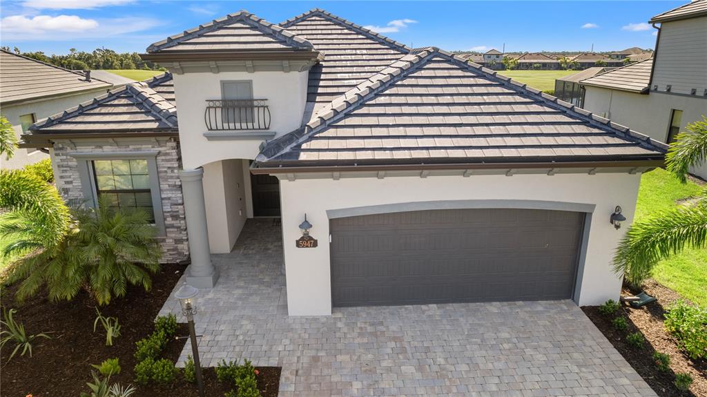 a front view of a house with a garage