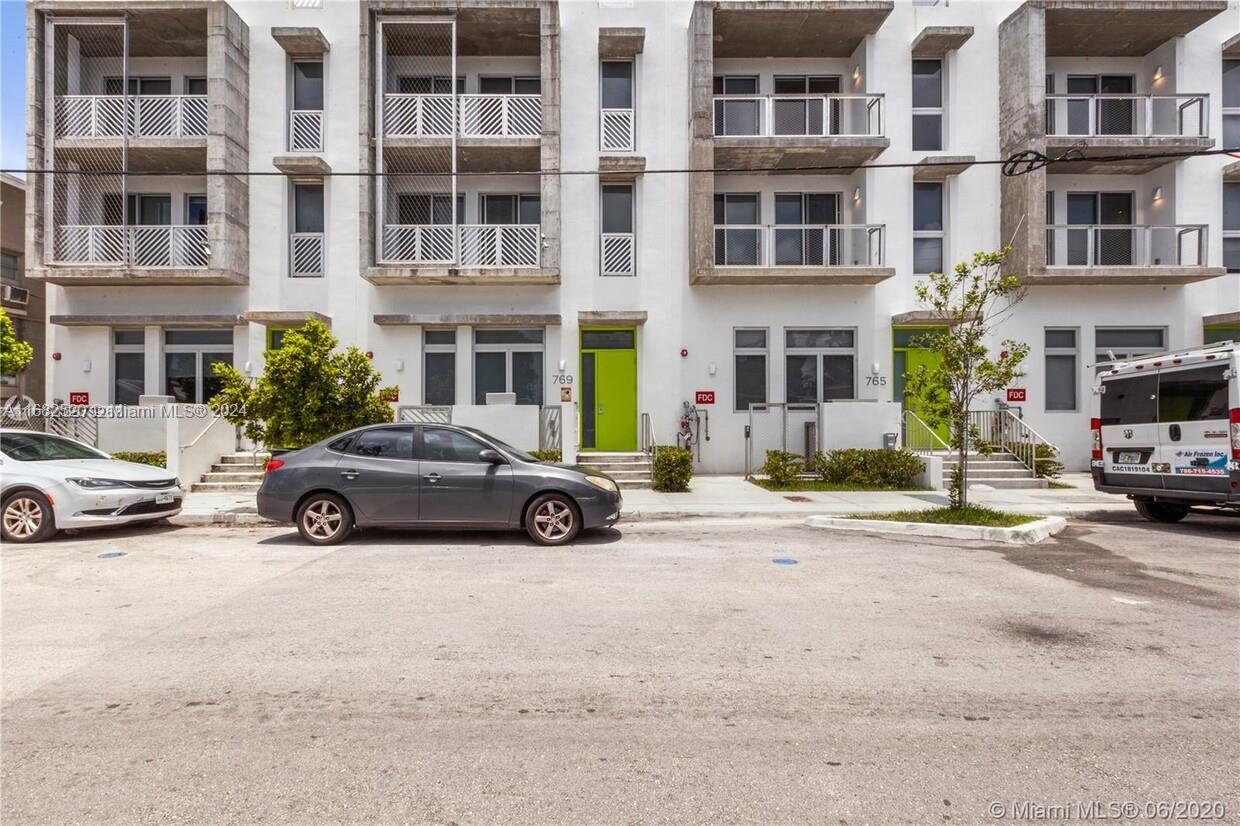 a car parked in front of a building