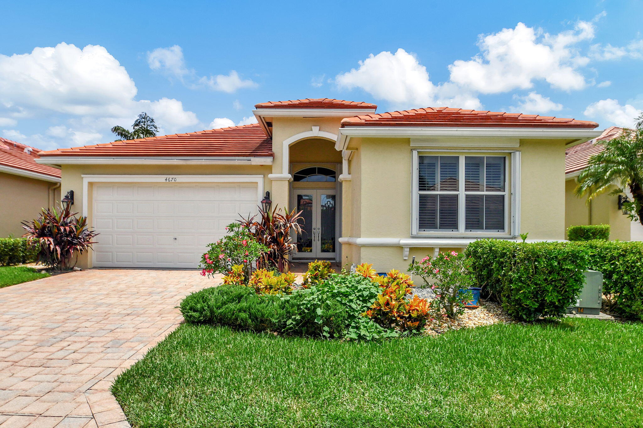 front view of a house with a yard