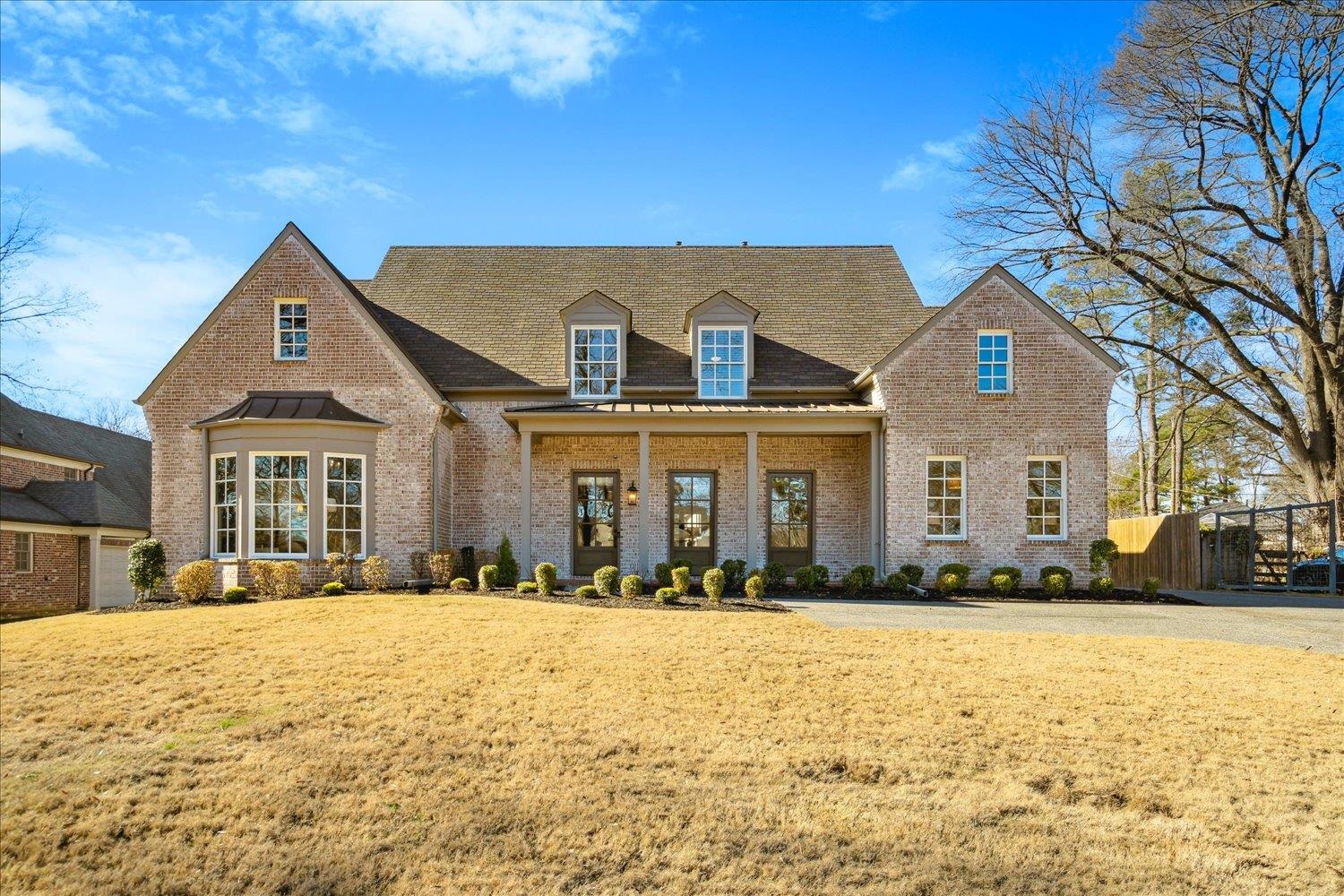 a front view of house with yard