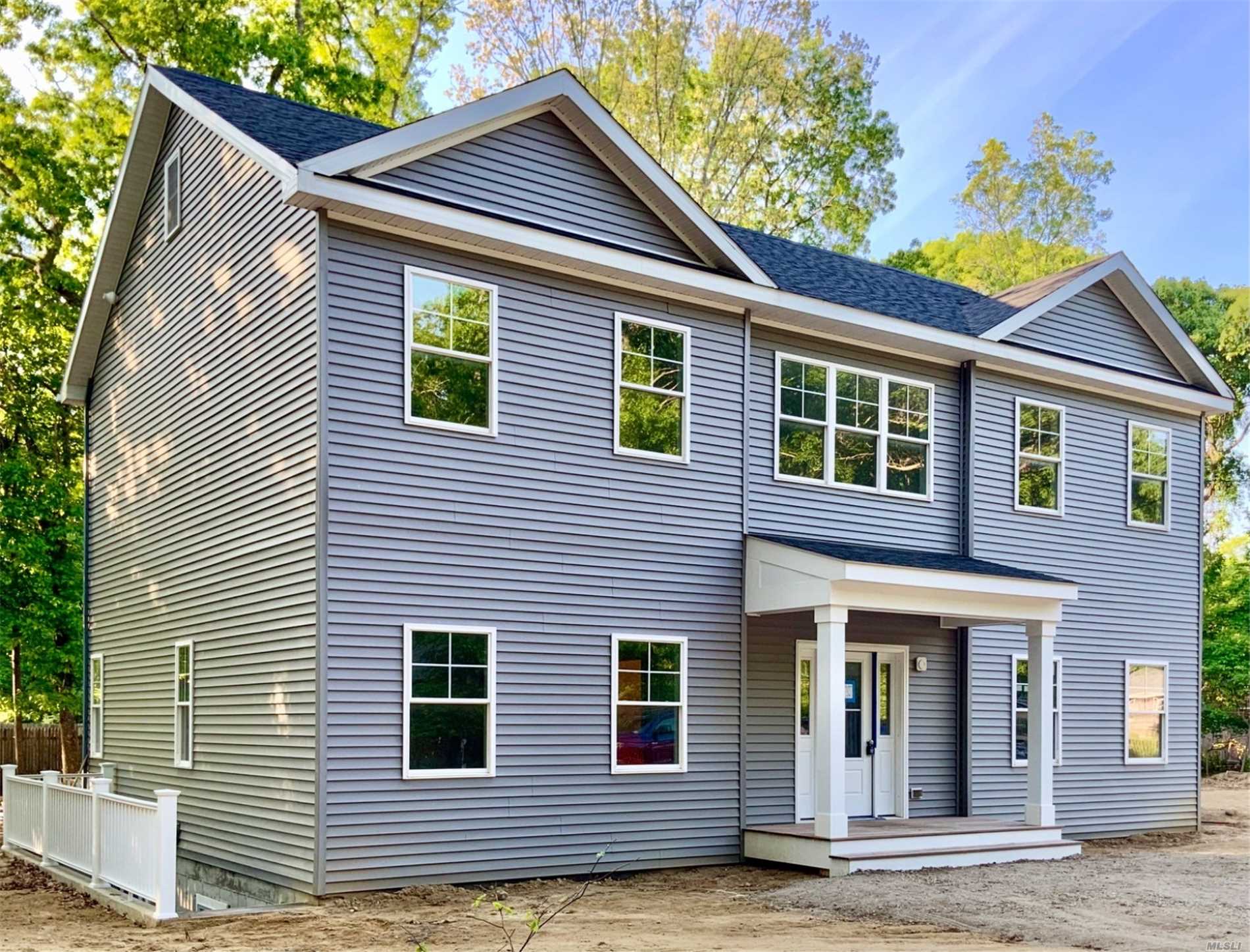 a view of a house with a garage