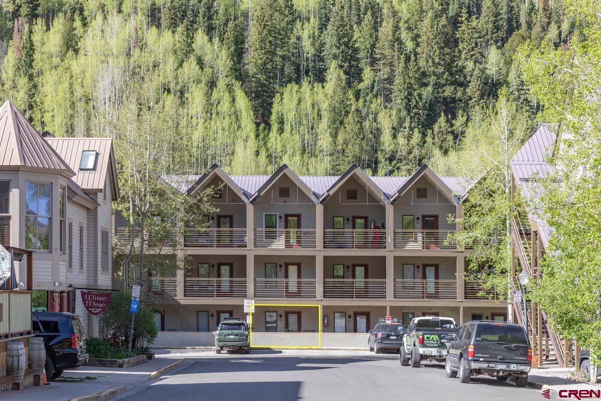 a front view of a building with street view