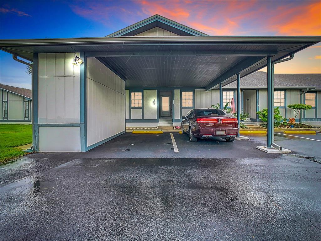 a car parked in front of a house