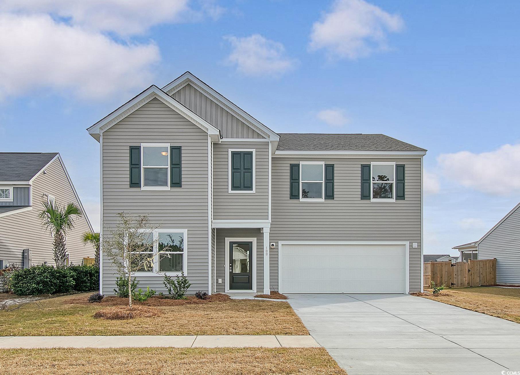 View of front facade with a garage