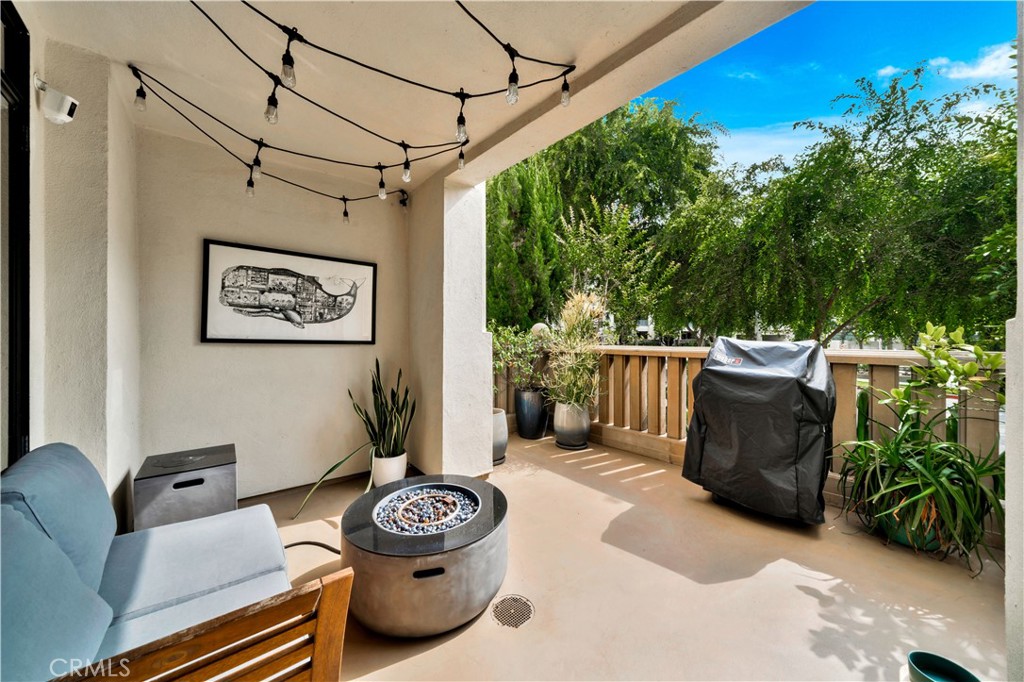 a view of a chairs and table on the deck