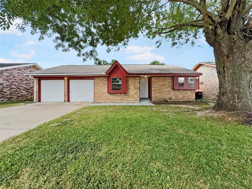 front view of a house with a big yard