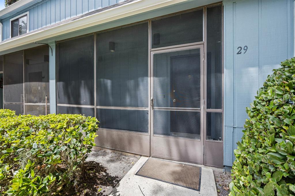 a view of a glass door of the house