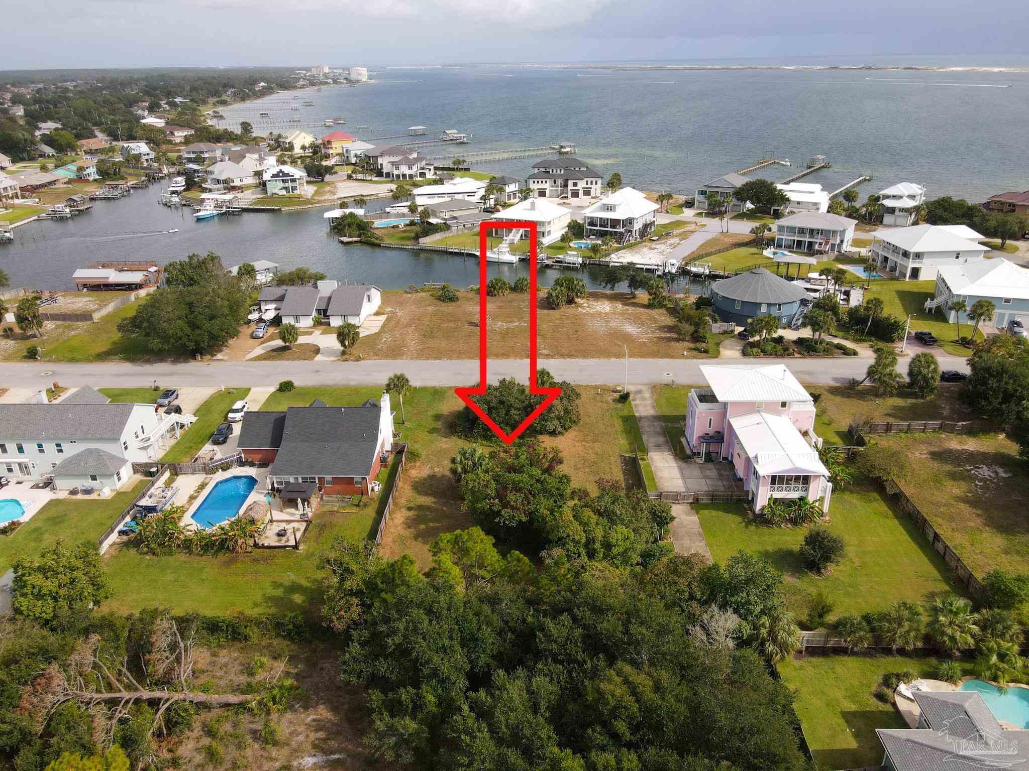 an aerial view of a houses with outdoor space