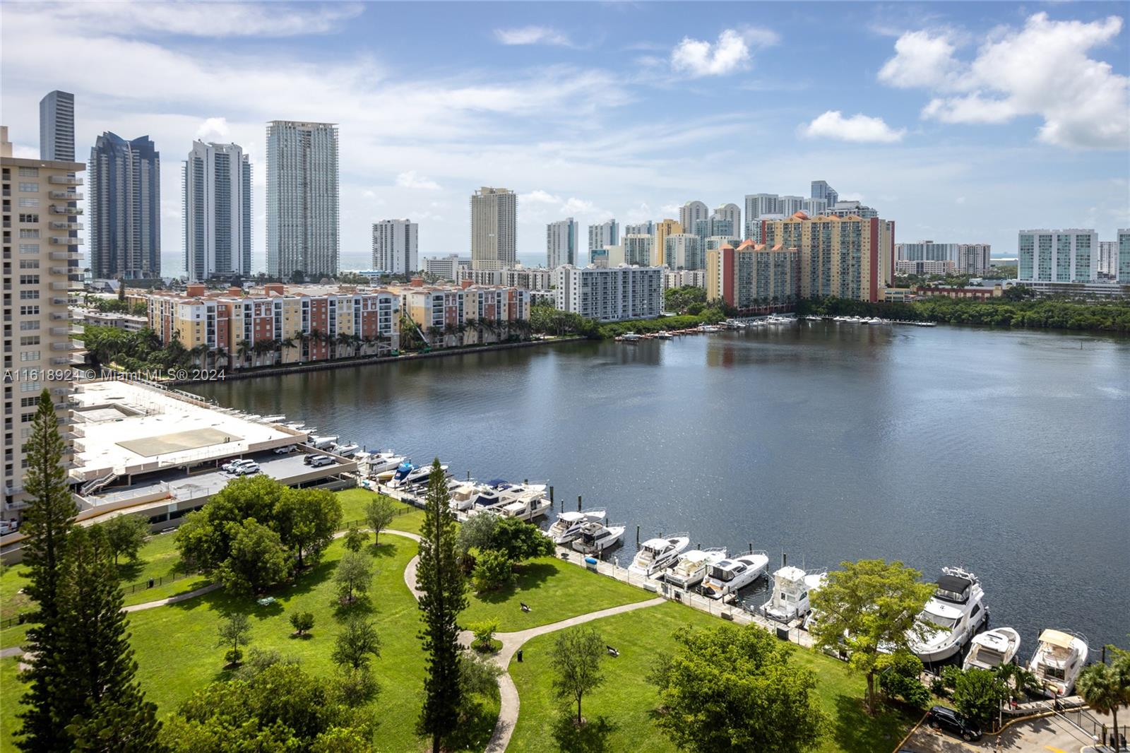 a view of a city with a lake