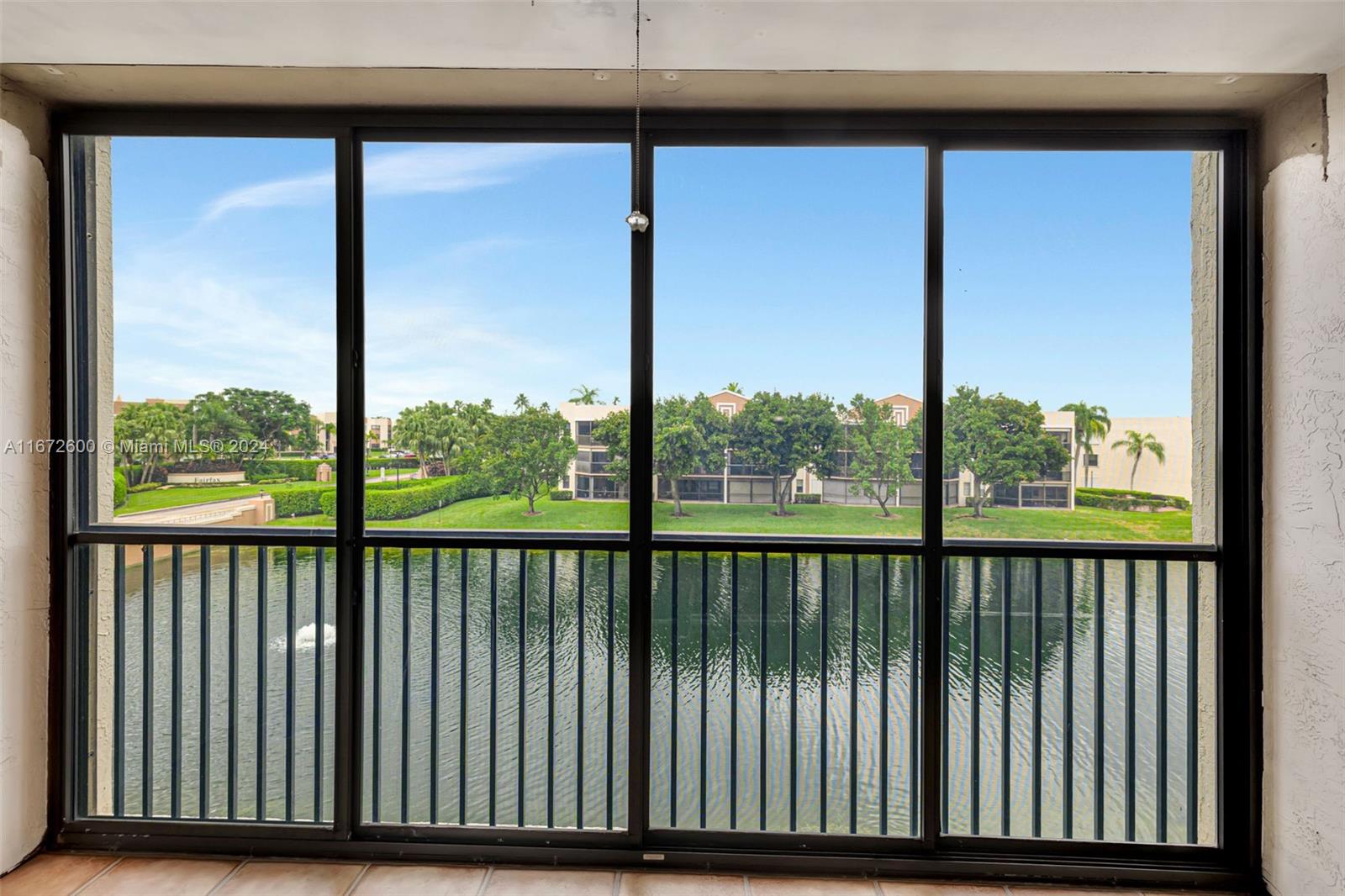 a view of a large window with an outdoor view