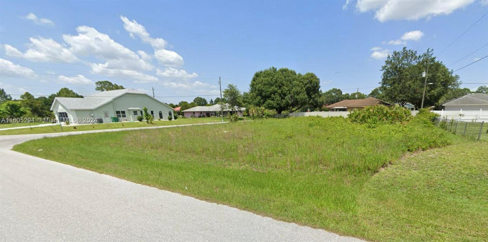 a view of a house with a big yard