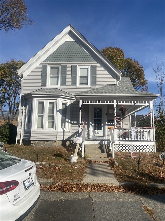 a front view of a house with a porch