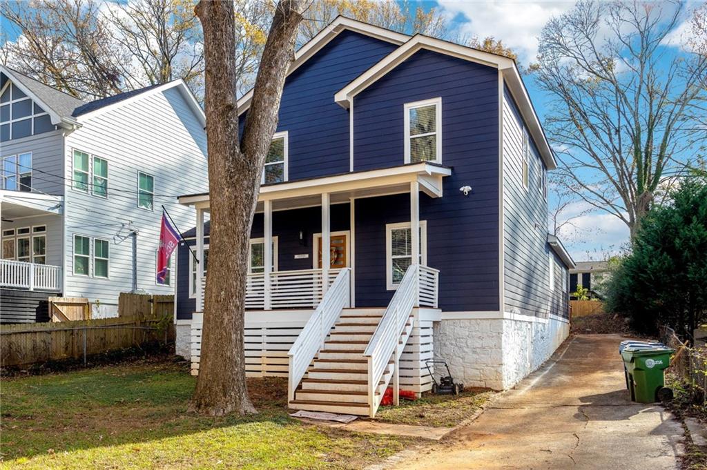 a view of a house with a yard