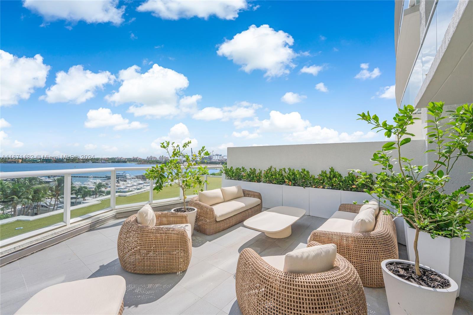 a view of a balcony with furniture