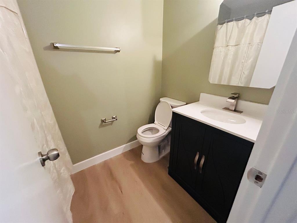 a bathroom with a sink and a toilet