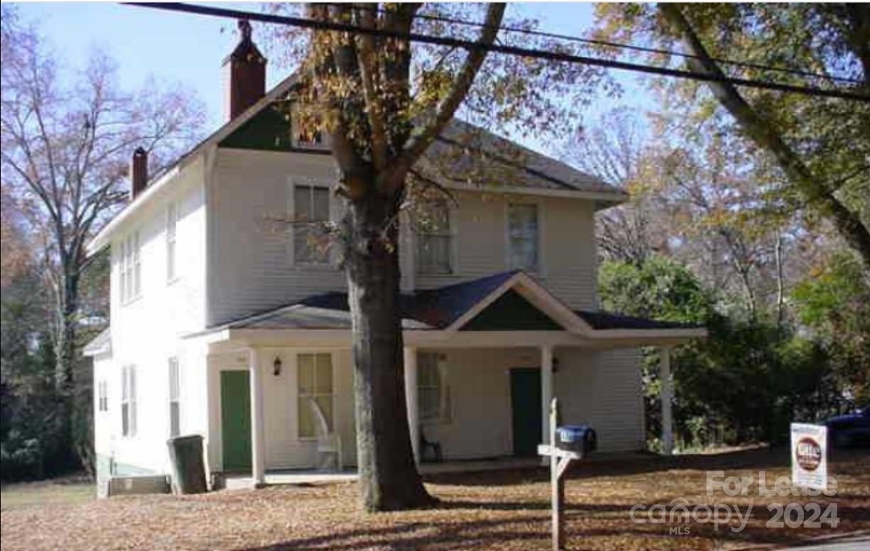 a front view of a house with street