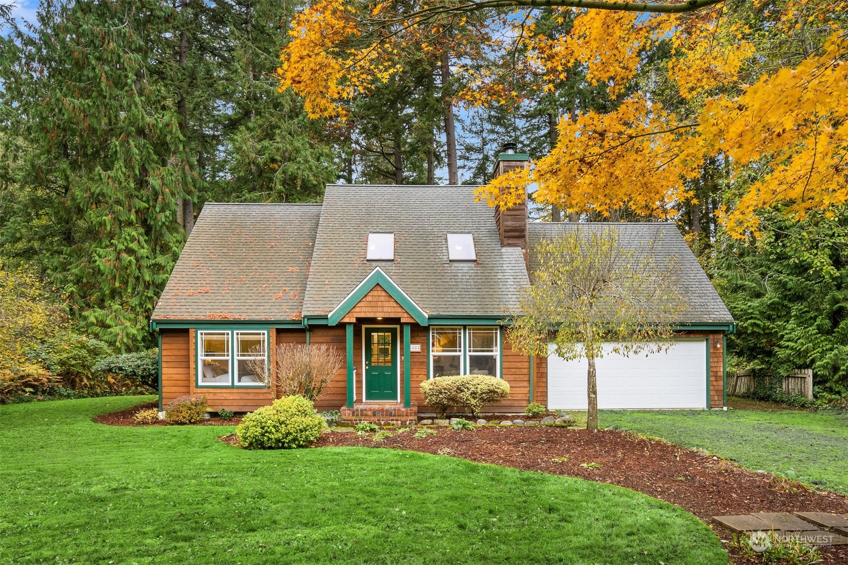 front view of a house with a yard