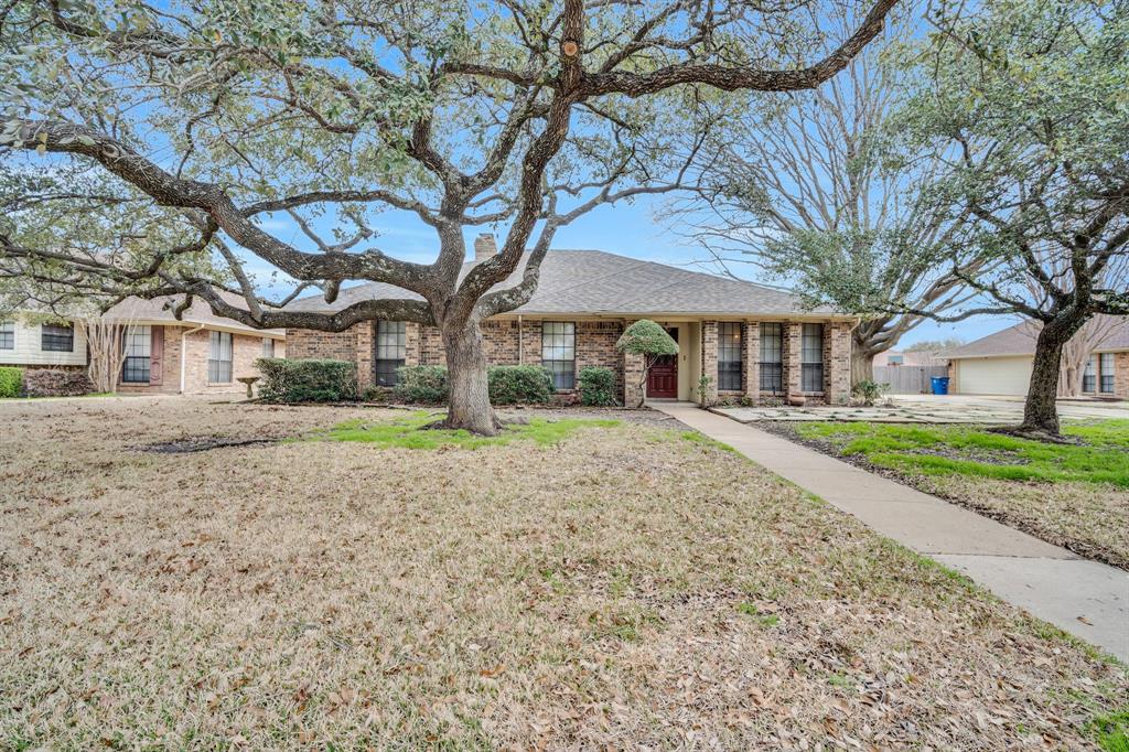 a house with trees in front of it