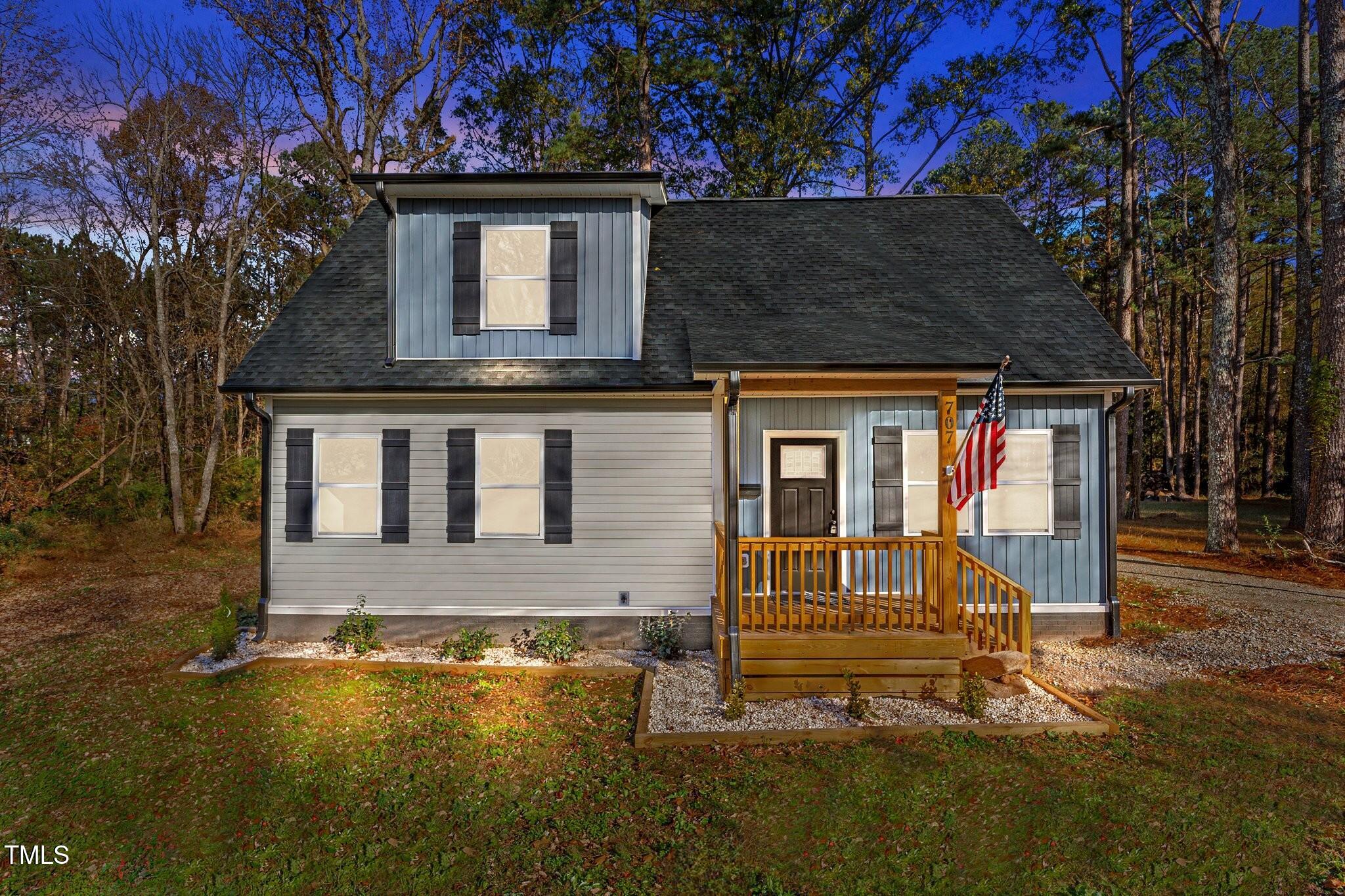 front view of house with a small yard