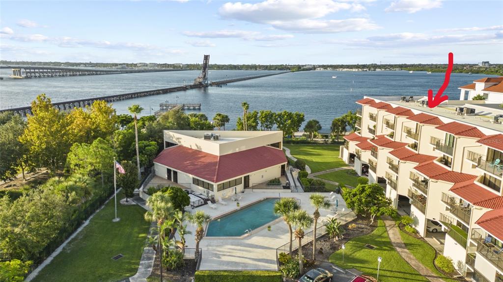 a view of a balcony with lake view and a ocean view