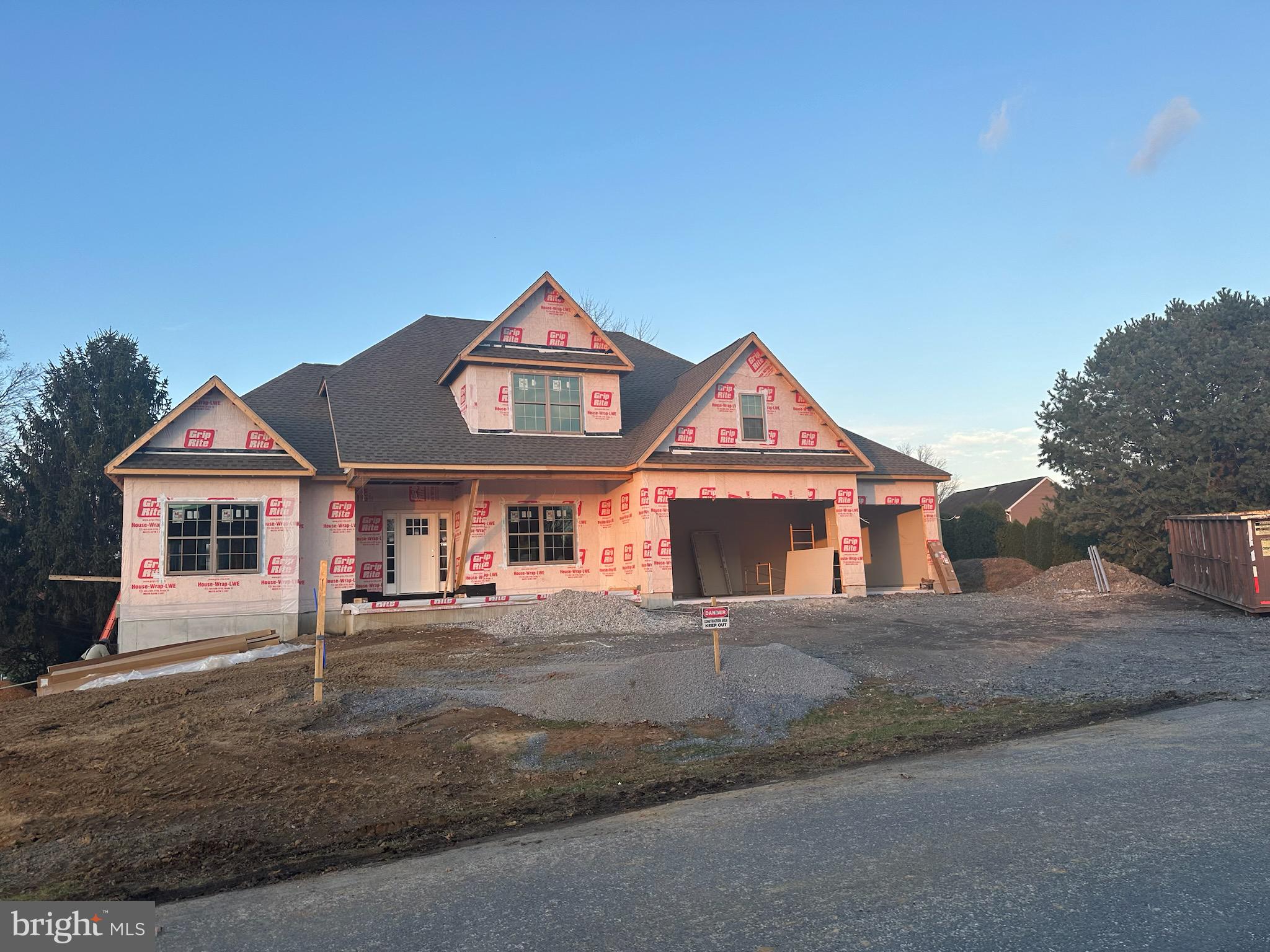 a front view of a house with yard